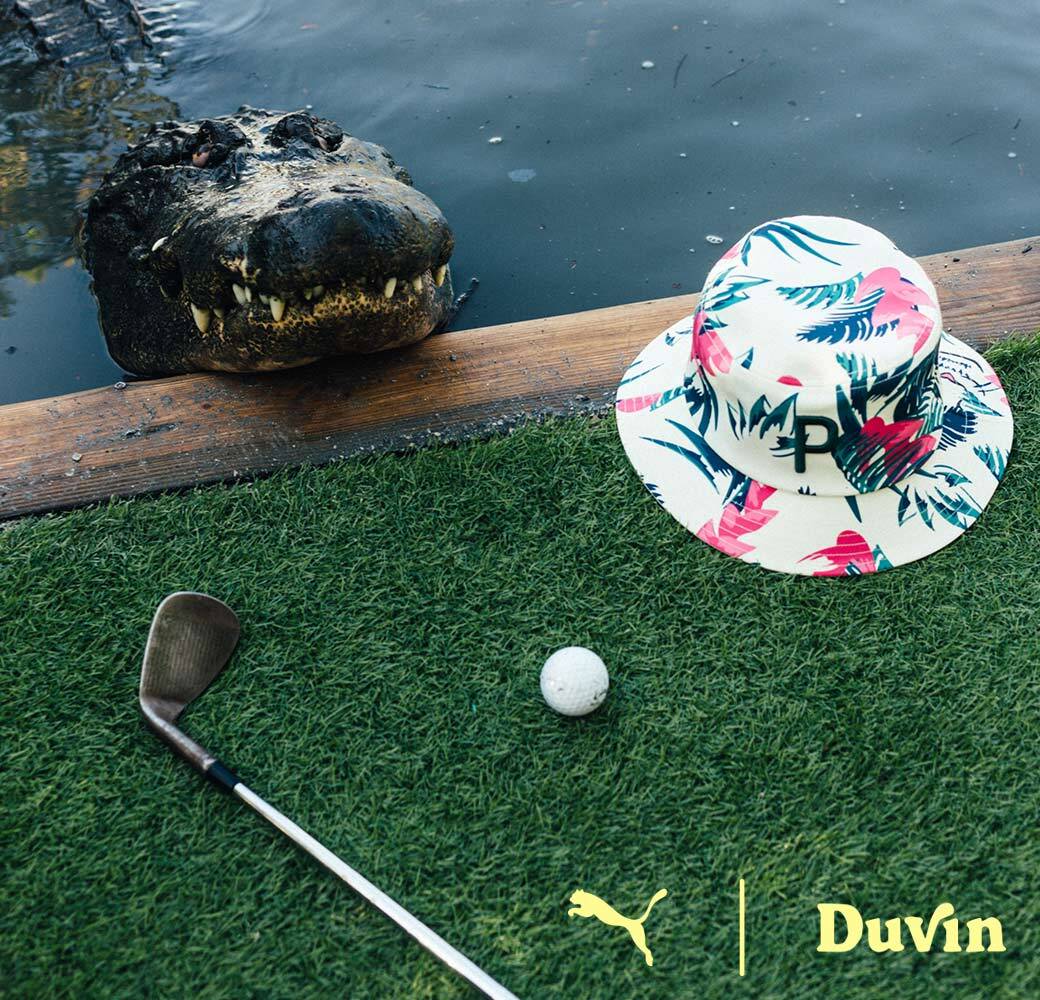 aligator with hat and golf club